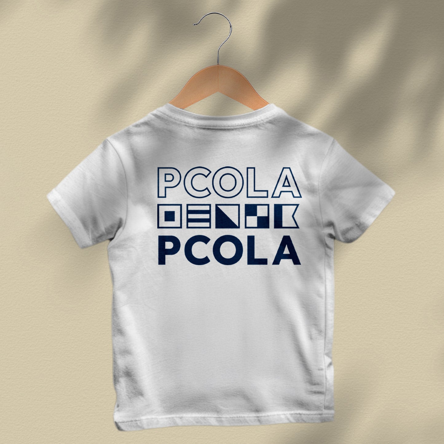 High-quality kids' t-shirt with a vibrant 'PCOLA' graphic, perfect for showing off Pensacola pride in a trendy and comfy way.
