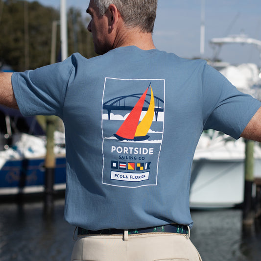 Adult t-shirt featuring an artistic graphic of the iconic Pensacola Bay Bridge, perfect for lovers of Pensacola’s scenic beauty.