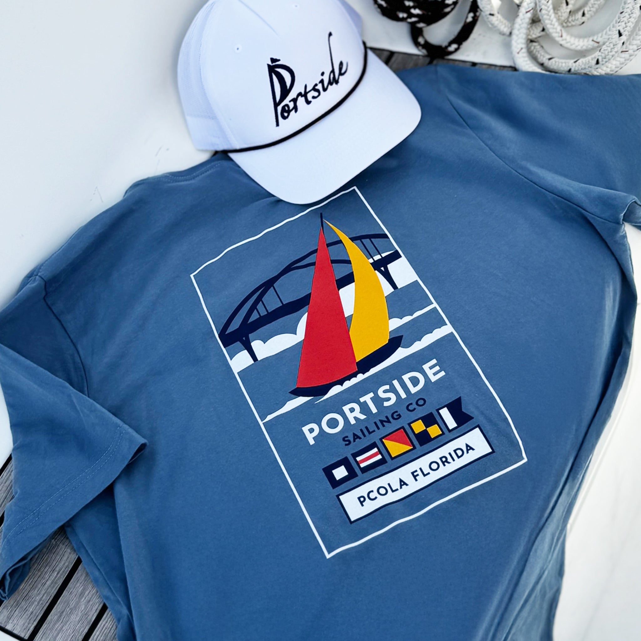 Adult t-shirt featuring an artistic graphic of the iconic Pensacola Bay Bridge, perfect for lovers of Pensacola’s scenic beauty.